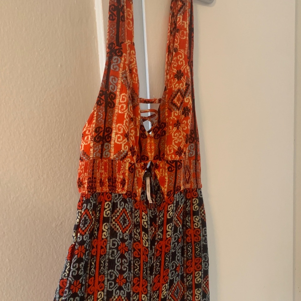Boho Orange Printed Jumpsuit with Pockets and Keyhole design